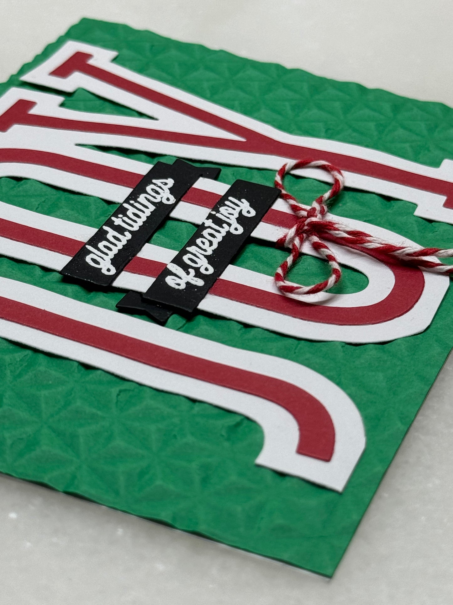 Joy glad tidings green/red