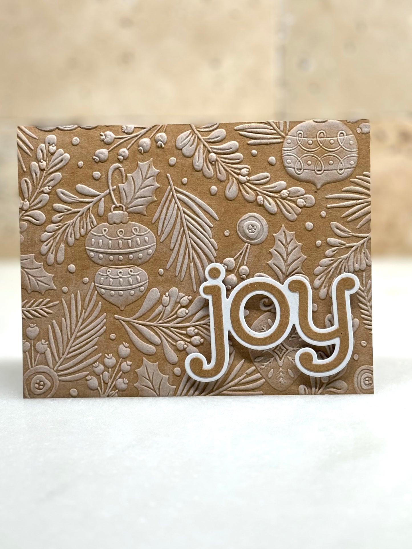 Joy on Embossed Kraft w/wht